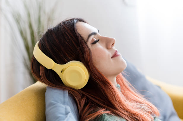 Medium shot of a woman with headphones